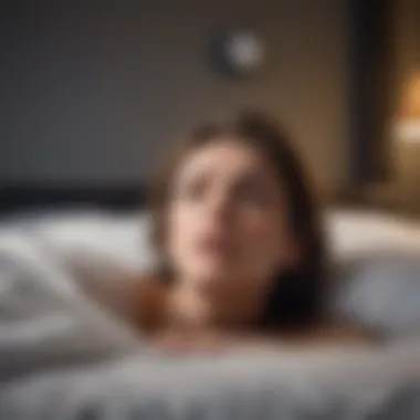 A person lying awake in bed, staring at the ceiling in distress